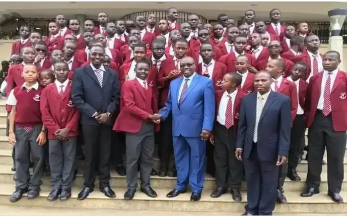 Best high schools in Nyanza Kenya. Image showing Kanga high school great students with teachers.